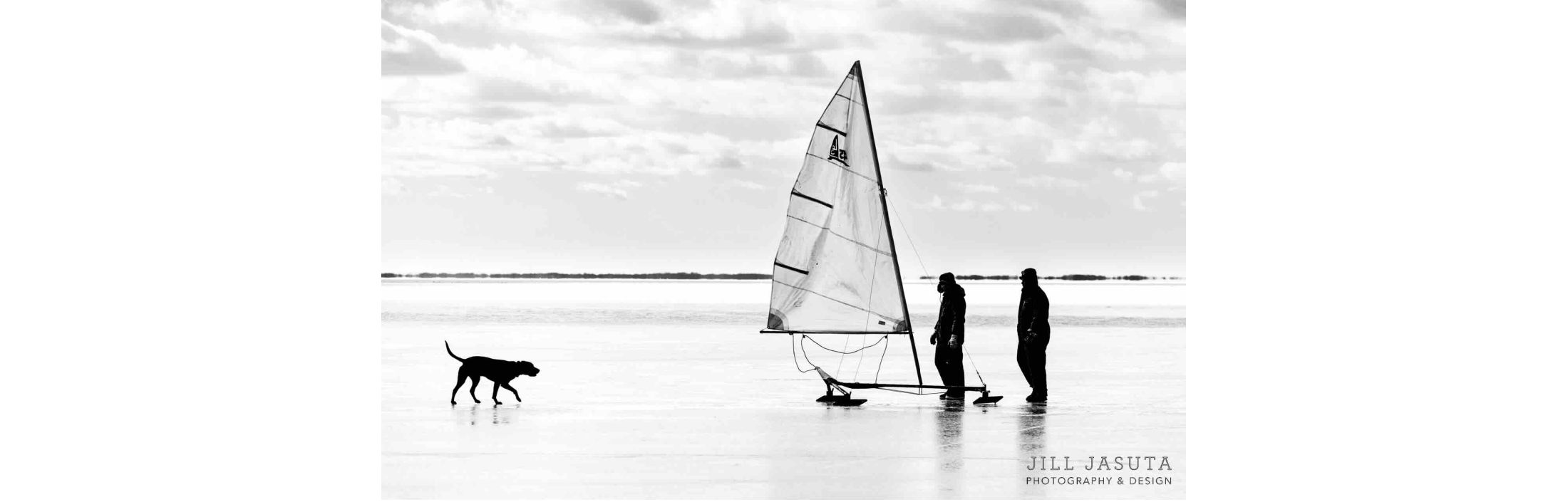 Two Men A Dog An Iceboat